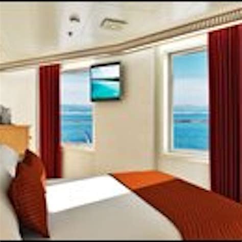 Elevate your vacation with a Carnival Magic spa balcony cabin